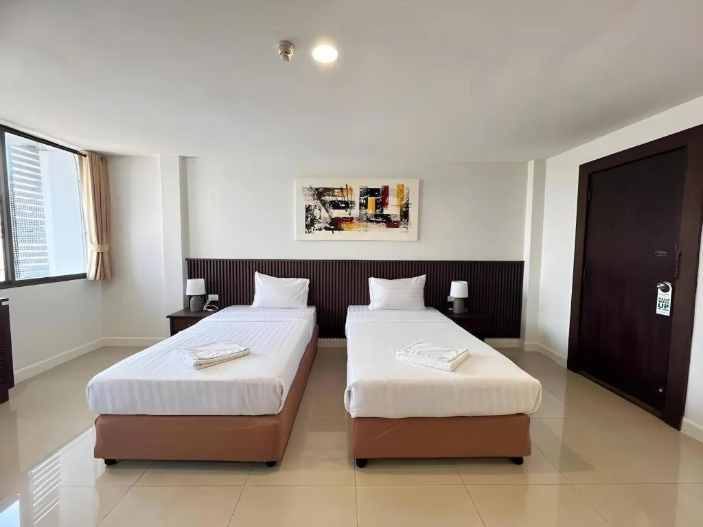 Bed in Laemchabang City Hotel