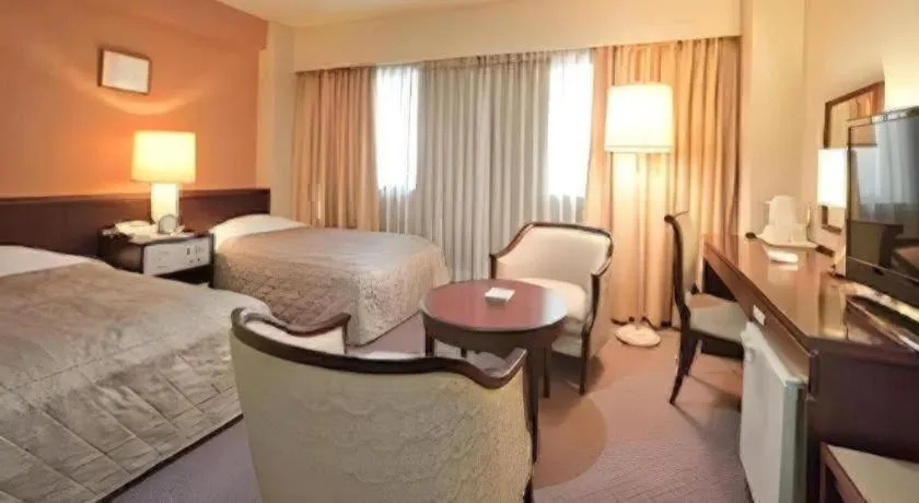 Bed in Oita Century Hotel