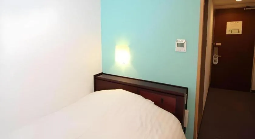 Bed in Oita Century Hotel