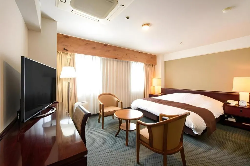 Bed in Oita Century Hotel