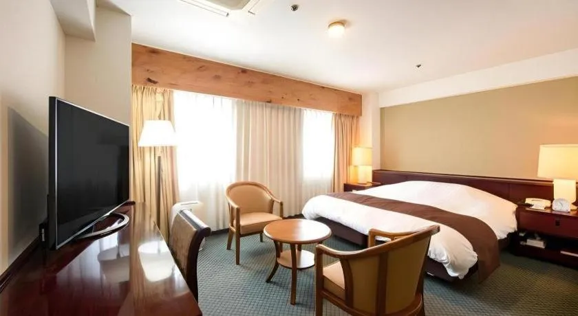 Bed in Oita Century Hotel