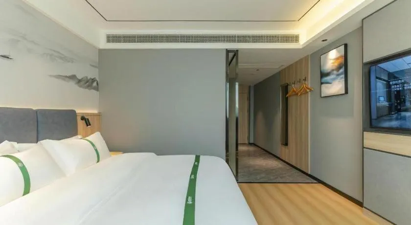 Bed in GreenTree Inn Bozhou Weiwu Road Hotel