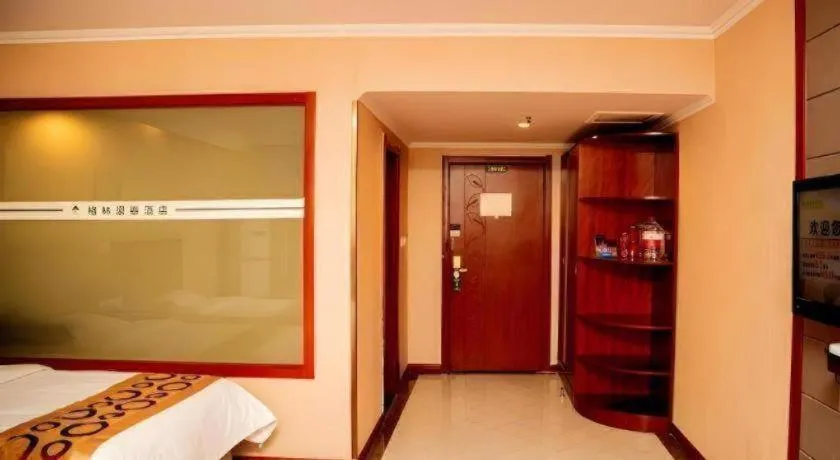 Bed in GreenTree Inn Bozhou Weiwu Road Hotel