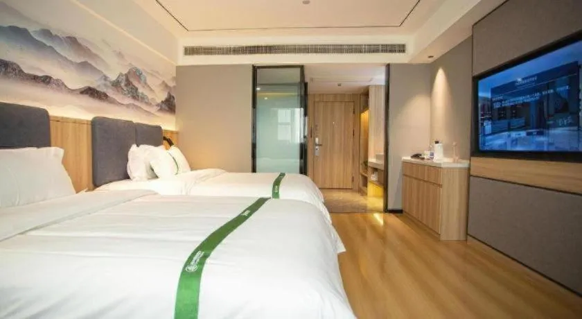 Bed in GreenTree Inn Bozhou Weiwu Road Hotel