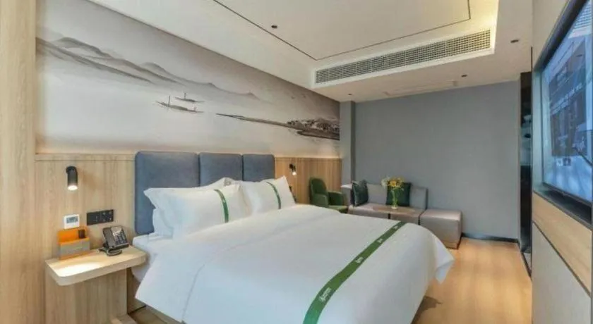 Bed in GreenTree Inn Bozhou Weiwu Road Hotel