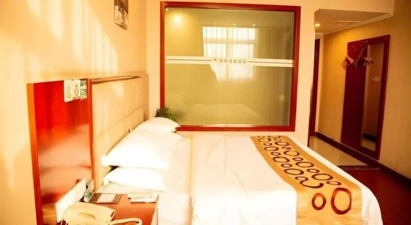 Bed in GreenTree Inn Bozhou Weiwu Road Hotel