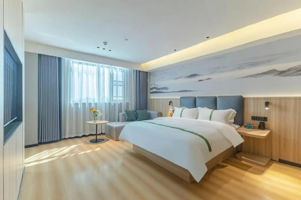 Bed in GreenTree Inn Bozhou Weiwu Road Hotel