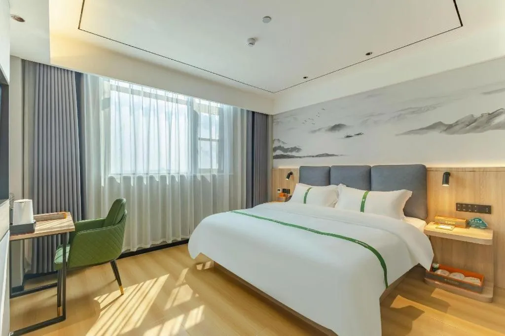 Bed in GreenTree Inn Bozhou Weiwu Road Hotel