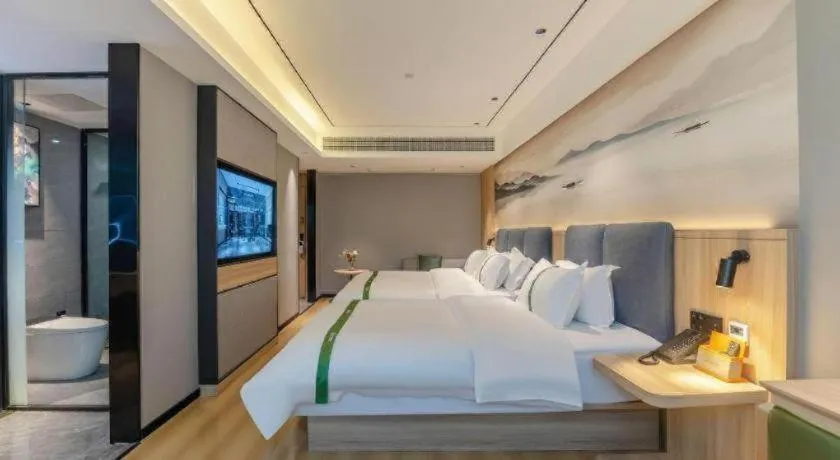 Bed in GreenTree Inn Bozhou Weiwu Road Hotel