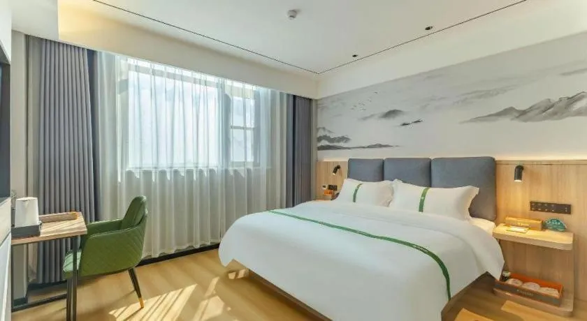 Bed in GreenTree Inn Bozhou Weiwu Road Hotel