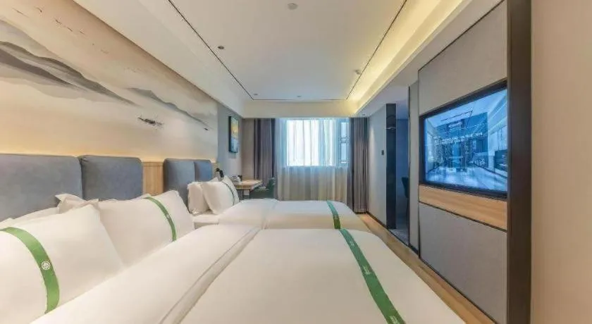 Bed in GreenTree Inn Bozhou Weiwu Road Hotel