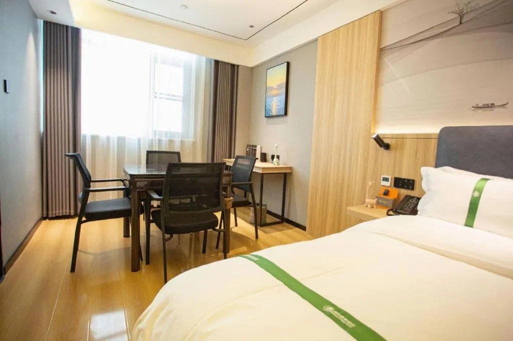 Bed in GreenTree Inn Bozhou Weiwu Road Hotel