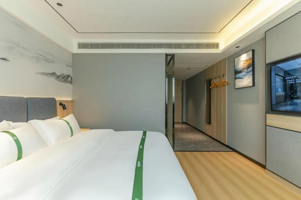 Bed in GreenTree Inn Bozhou Weiwu Road Hotel