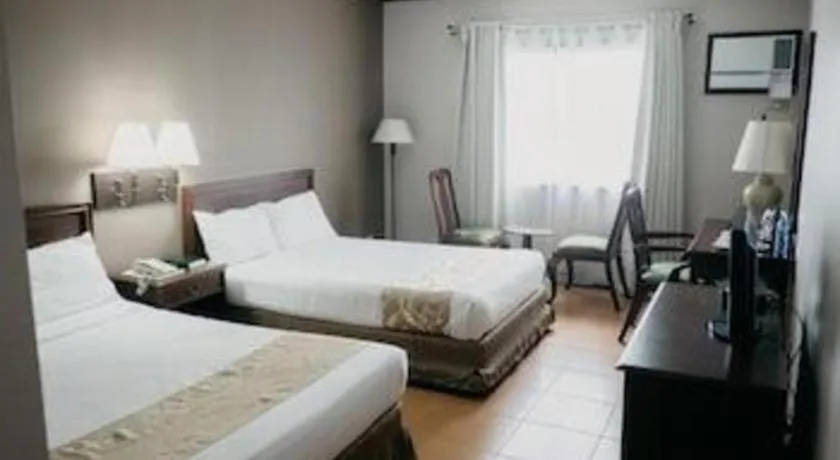 Bed in East Asia Royale Hotel