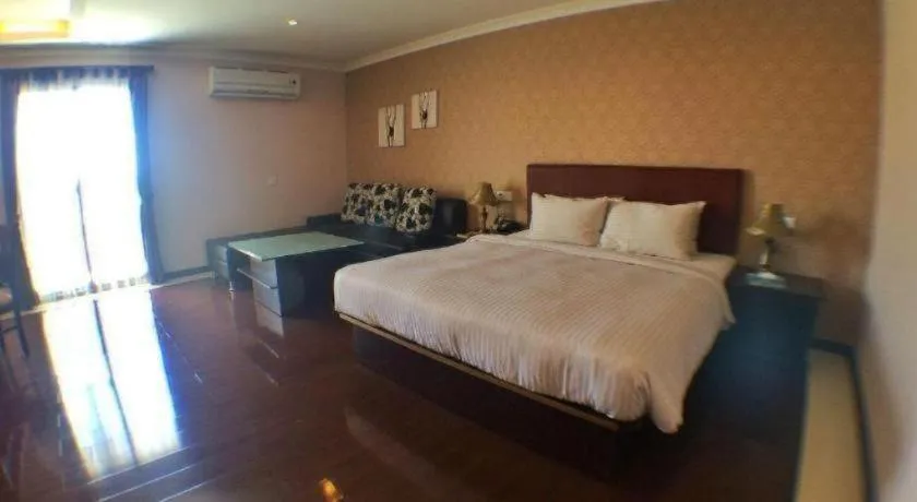 Bed in Grand Hoyah Hotel