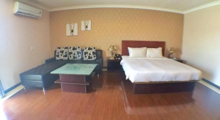 Bed in Grand Hoyah Hotel
