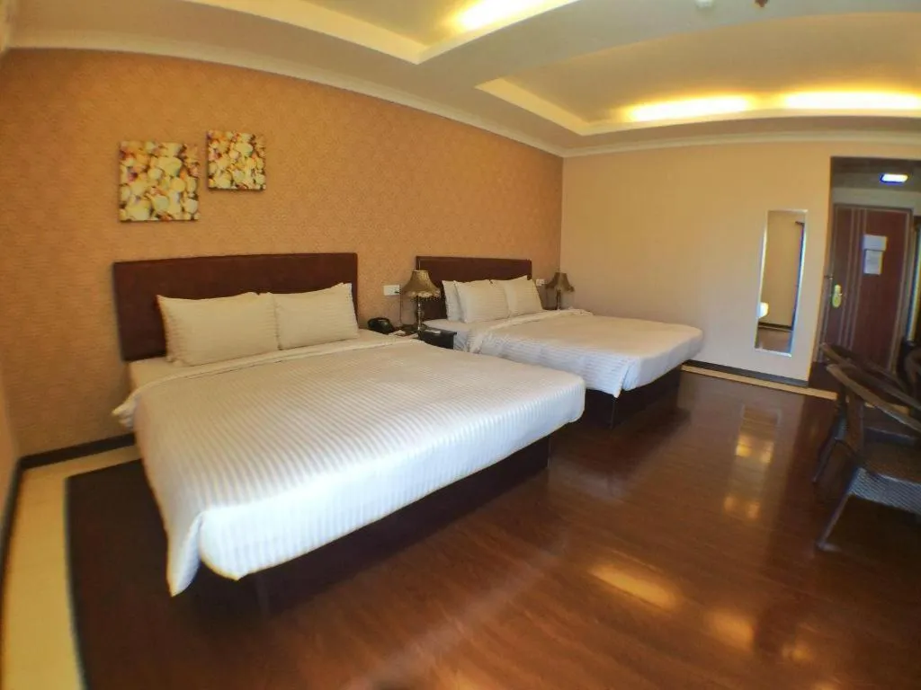 Bed in Grand Hoyah Hotel