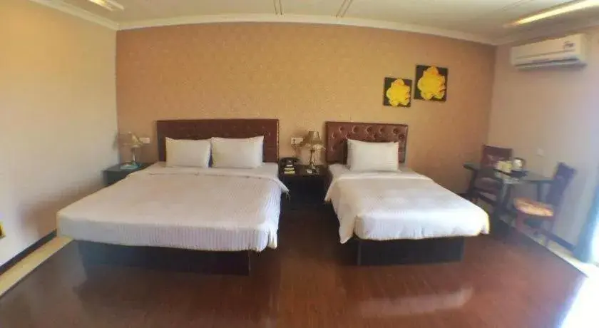 Bed in Grand Hoyah Hotel Bed in Grand Hoyah Hotel