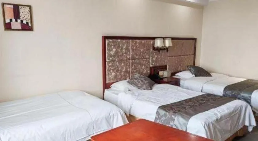 Bed in Changchun Global Hotel