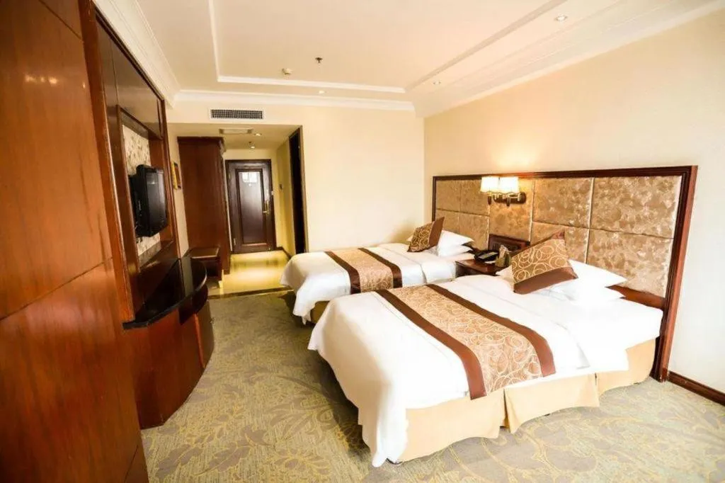 Bed in Changchun Global Hotel