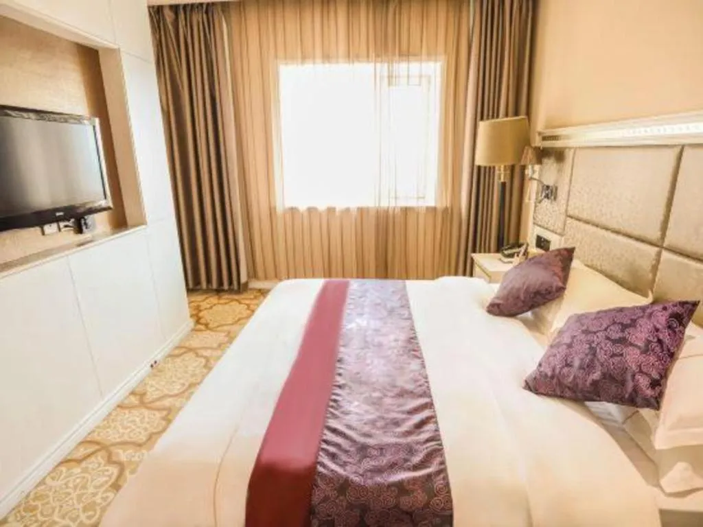 Bed in Changchun Global Hotel