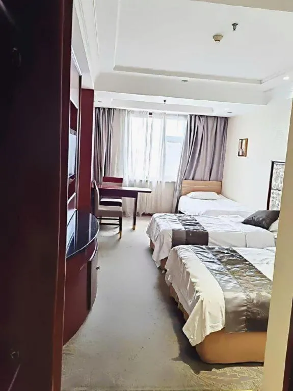 Bed in Changchun Global Hotel