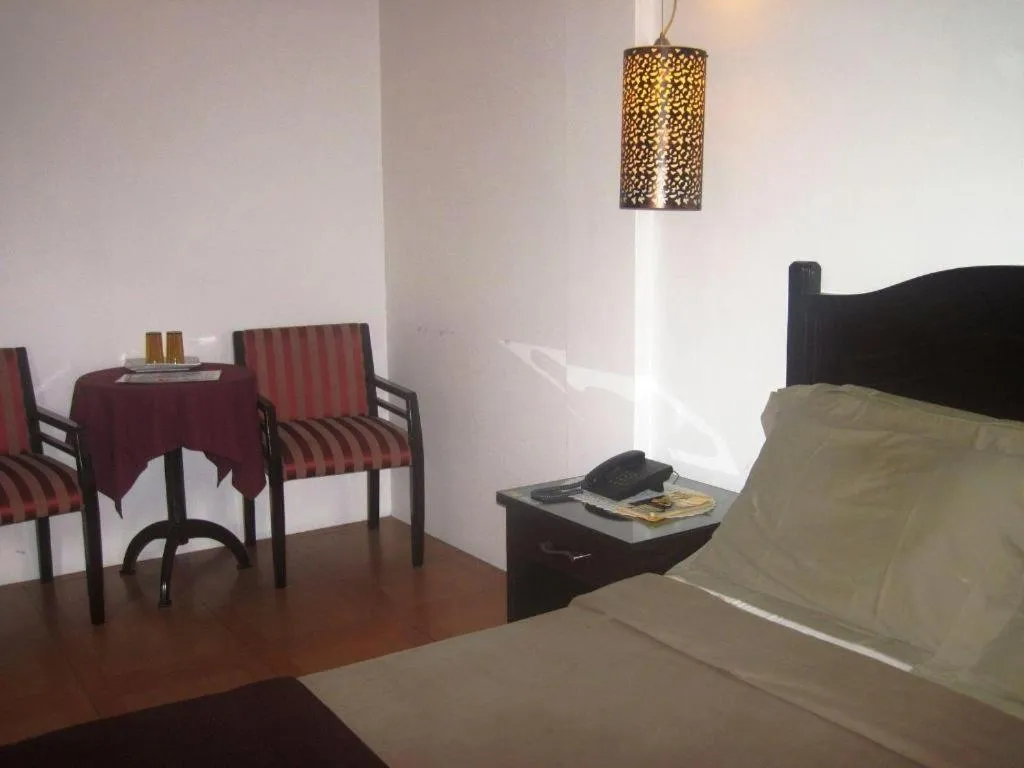 Bed in Alicia Hotel & Restaurant