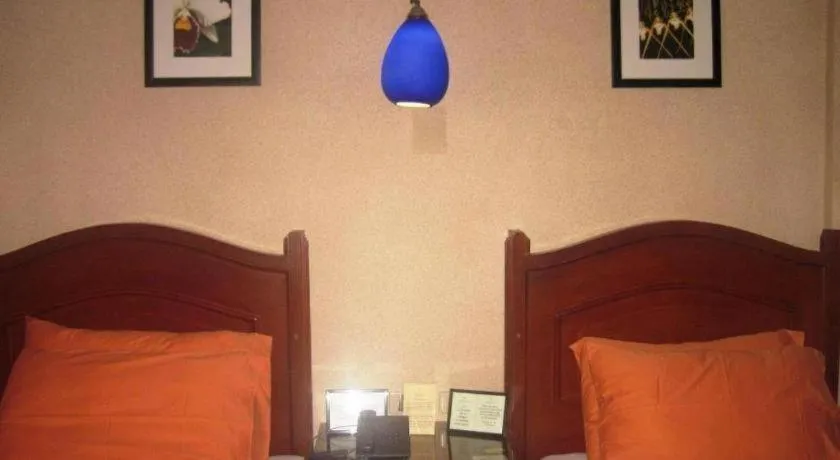 Bed in Alicia Hotel & Restaurant