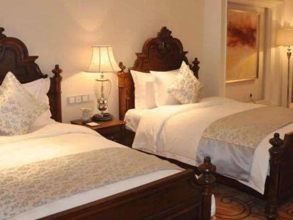 Bed in Zhengzhou Yiquan International Hotel