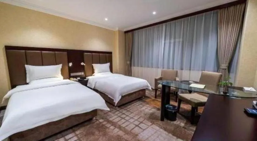 Bed in Jincheng Pacific Hotel