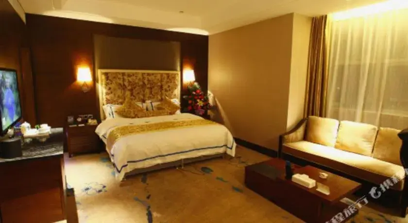 Bed in Jincheng Pacific Hotel Bed in Jincheng Pacific Hotel