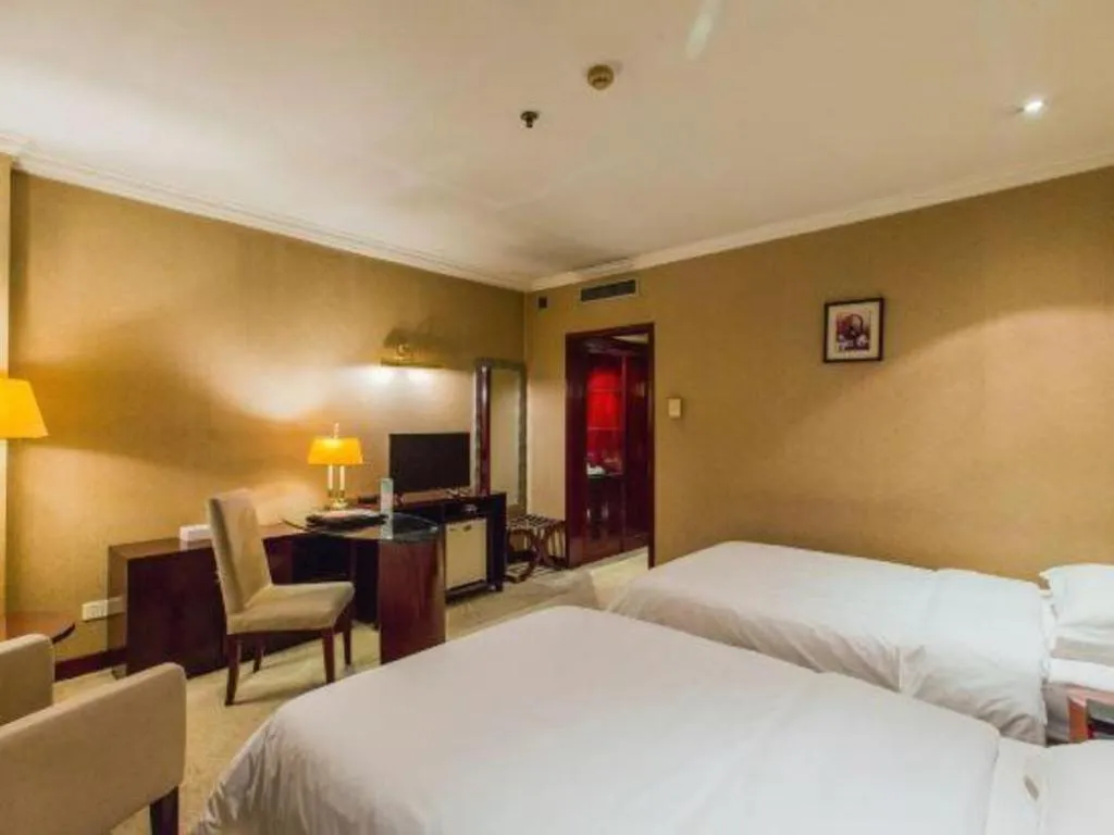 Bed in Jincheng Pacific Hotel