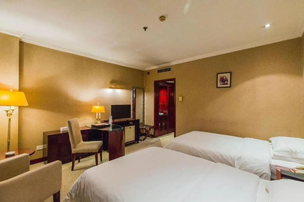 Bed in Jincheng Pacific Hotel