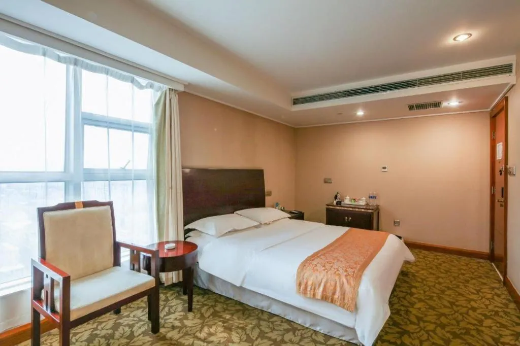 Bed in Jincheng Pacific Hotel