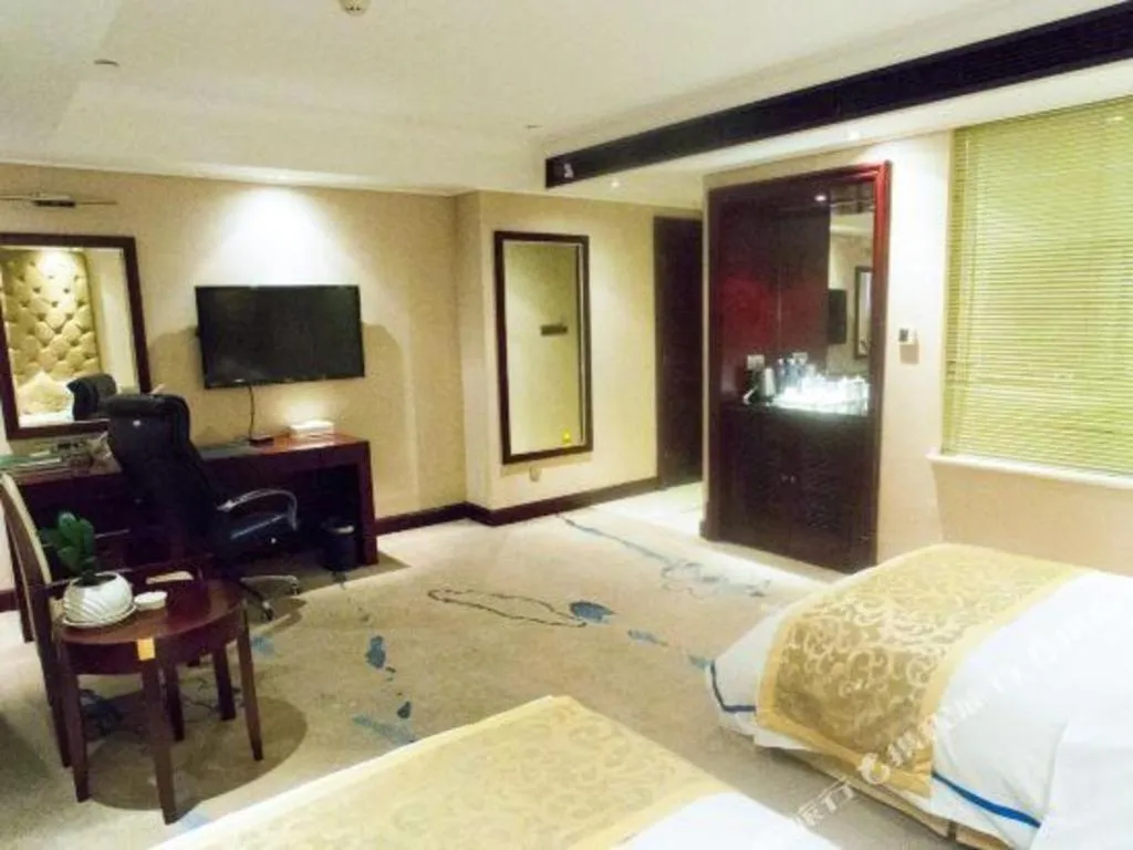 Bed in Jincheng Pacific Hotel