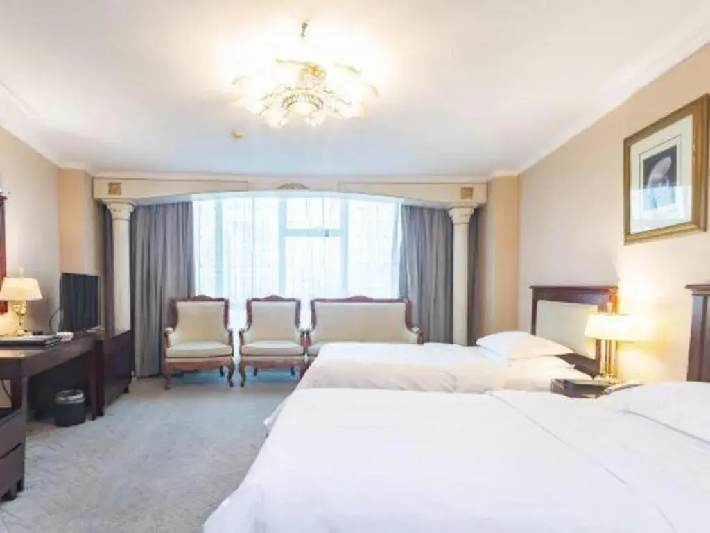 Bed in Jincheng Pacific Hotel Bed in Jincheng Pacific Hotel