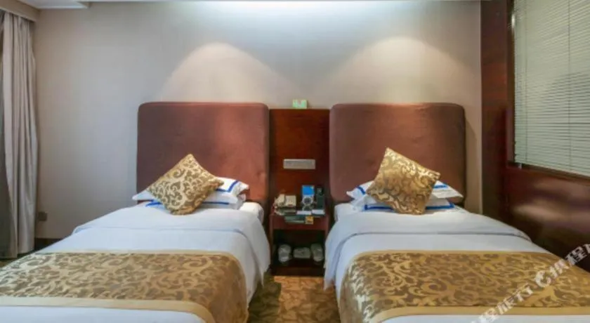 Bed in Jincheng Pacific Hotel