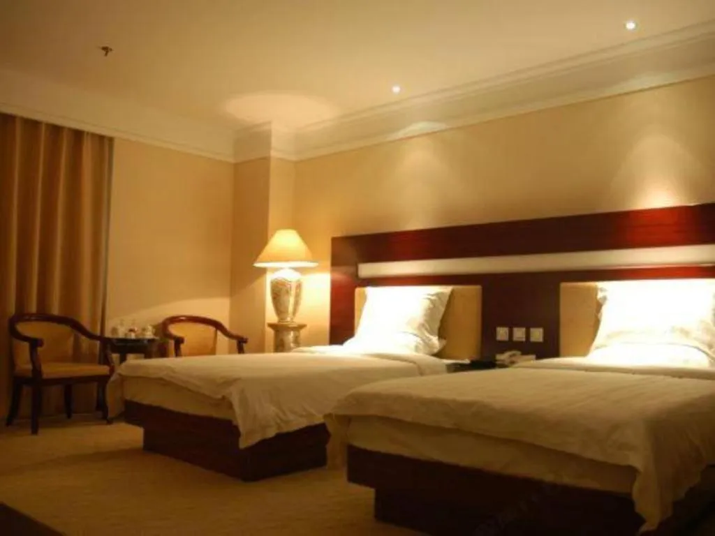 Bed in Jincheng Pacific Hotel