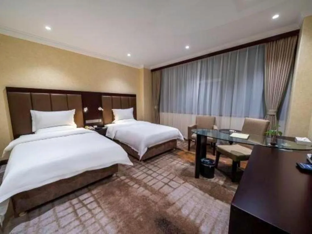 Bed in Jincheng Pacific Hotel