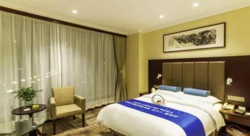 Bed in Jincheng Pacific Hotel Bed in Jincheng Pacific Hotel