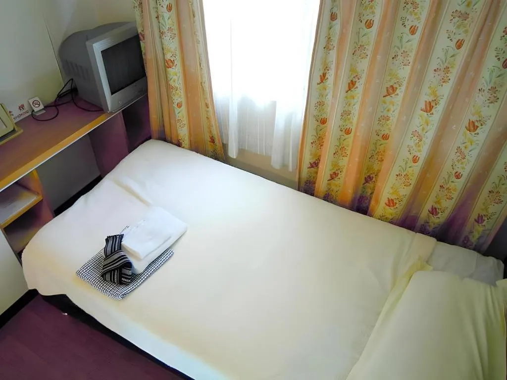 Bed in Eishinkan Hotel
