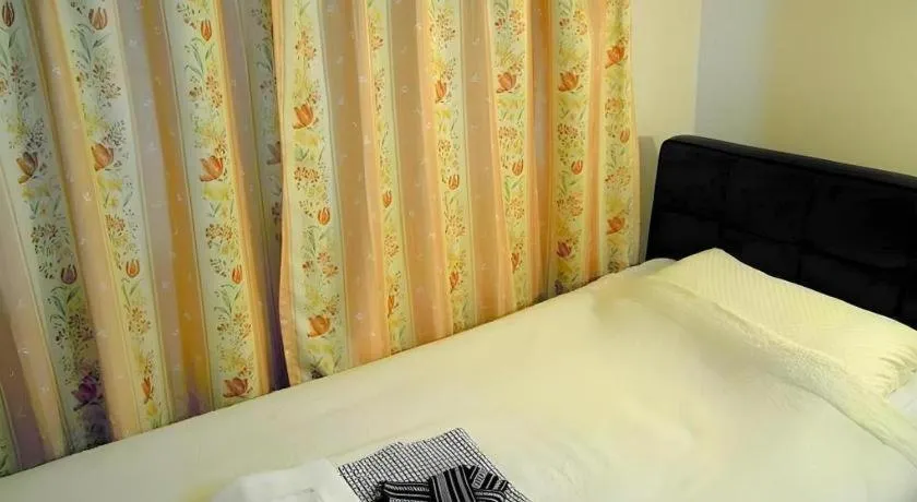 Bed in Eishinkan Hotel