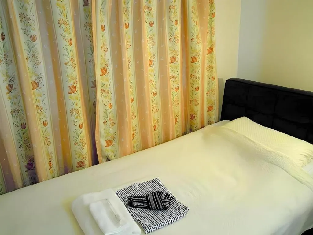 Bed in Eishinkan Hotel