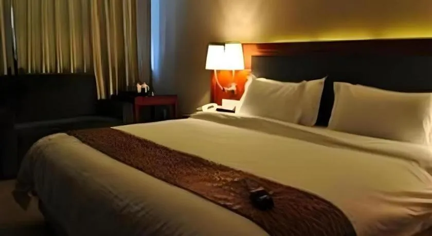 Bed in Guangna Hotel