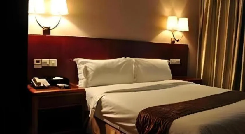 Bed in Guangna Hotel