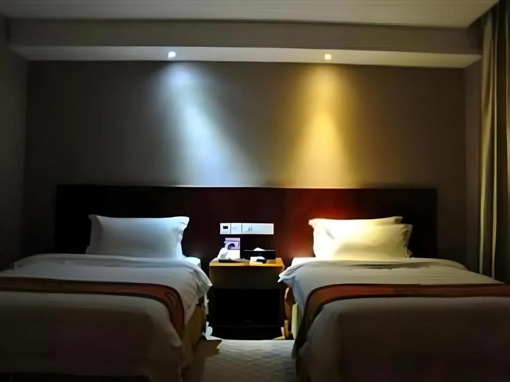 Bed in Guangna Hotel