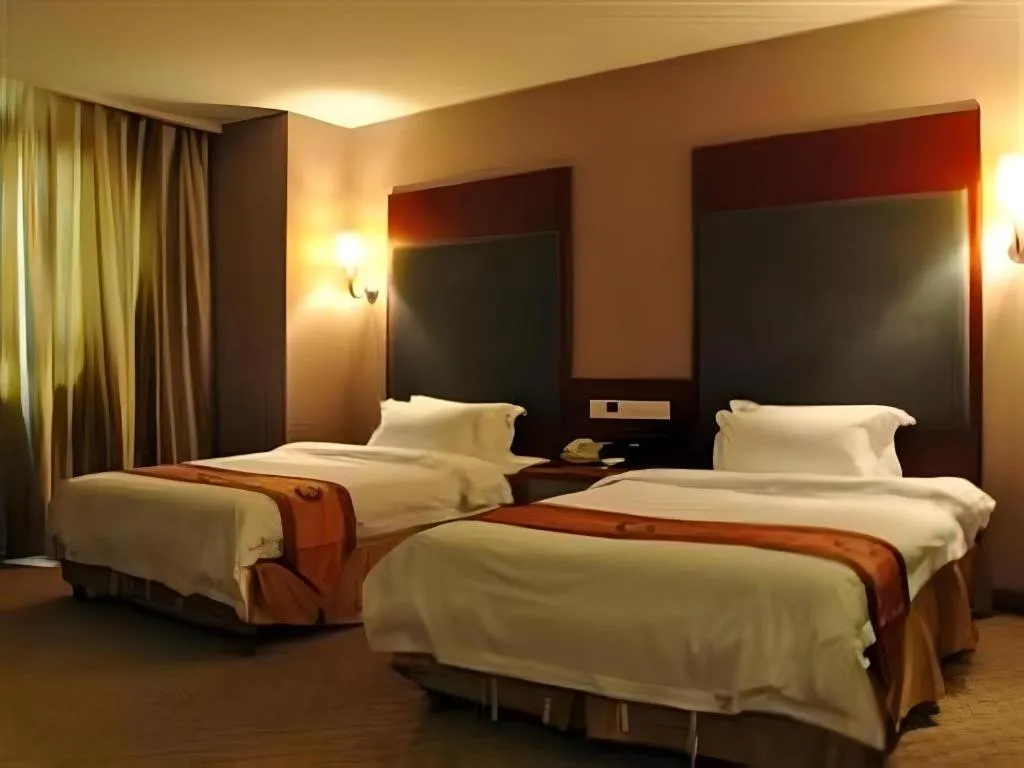 Bed in Guangna Hotel