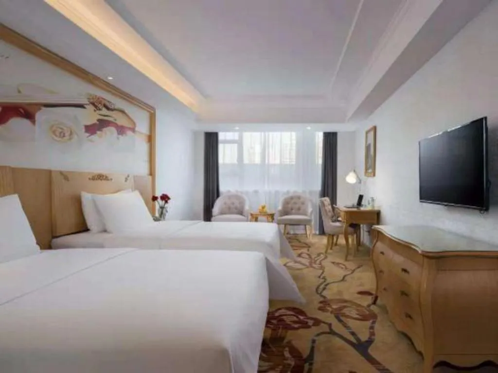 Bed in Guangna Hotel