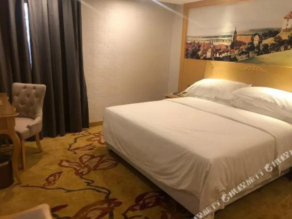 Bed in Guangna Hotel