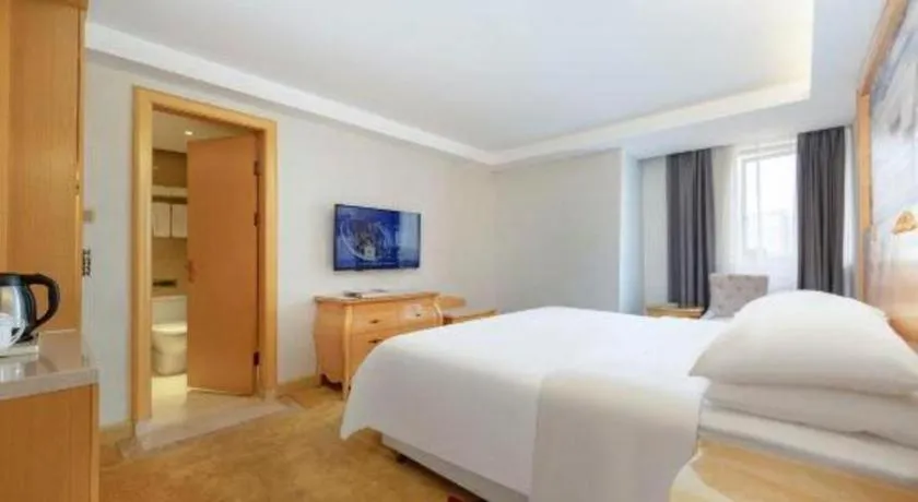 Bed in Guangna Hotel